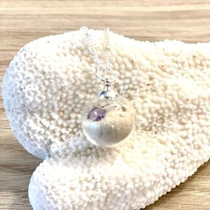 99. Amethyst beach sand globe necklace
